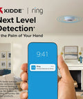 Smart Smoke And CO Detector With Ring App Alerts Hardwired With AA Battery Backup Ring Compatible Real Time Notifs 25 Percent Faster Smoke Detection No Subscription Needed Home Safety Tech installed on ceiling with phone alert
