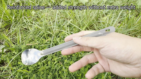 Hand holding Ultralight Titanium Long-Handle Spoon with Polished Bowl for Trail-Ready Hiking, Camping, and Backpacking