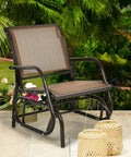 Cozy Brown Swing Glider Chair With Sturdy Metal Frame for patio garden porch and poolside relaxation, outdoor scene