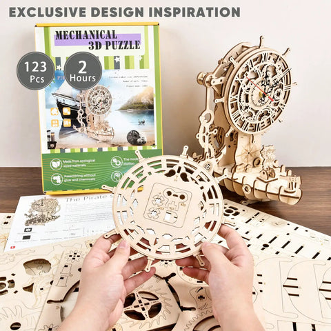 Pirate Ship Mechanical Clock Puzzle Kit For Adults And Teens, DIY Wood Craft Model That Builds Into A Fully Working Clock, Nautical Home Decor Gift, Unique Desk Shelf Art And Hands On Timepiece. Wooden gear clock pieces and box shown.