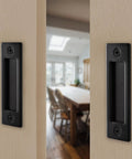 Matte Black Sliding Barn Door Handles Set, 2 Pack With Hardware Kit For Interior Use shown on door in modern kitchen