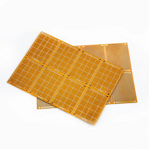 Two stacked 20 Piece 5 By 7 Cm Yellow Universal Breadboard Prototyping Boards Single Sided Bakelite Circuit Boards for electronics.
