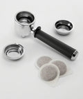 Portafilter set with filter baskets and coffee pods for All In One Coffee And Espresso Maker With Dual Heating So You Can Brew Fast And Get Barista Grade Espresso 15 Bar Italian Pump Delivers Rich Flavor Adjustable Milk Frother For Creamy Cappuccinos And Lattes Glass 10 Cup Carafe COM532M Black