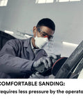 Person using Top Shelf Five Inch Hook And Loop Sanding Discs 120 Grit Net Backed for comfortable sanding on metal.