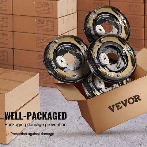Four VEVOR 12x2 in electric trailer brake assemblies with backing plates, front view in packaging box