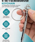 Silver Stainless Steel Eyeglass Repair Kit With 5 In 1 Mini Precision Screwdriver Set on keychain held in hand