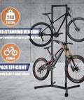 Freestanding Bike Storage Rack For Garage Holds Four Bikes With Adjustable Arms Gravity Indoor Stand Space Saving Vertical Design For MTB And Road Bikes Up To 240lbs No Drill Easy Setup displayed with two bikes mounted in a garage setting.