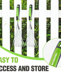 Two handy 16 inch compact stainless steel hand rakes with soft grip handles hanging on a fence, ideal for delicate garden tasks.