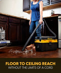 Badass Pro Grade 4 Gallon Cordless Wet Dry Shop Vacuum With 24V Lithium Ion Battery Toolbox Design being used to clean up broken glass.