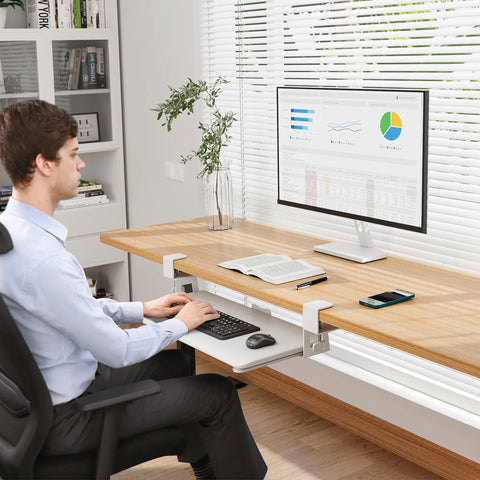 Under Desk Keyboard Tray With Smooth Pull Out Track, Ergonomic Mouse Platform For Office Space Hack in use with a worker at a desk.