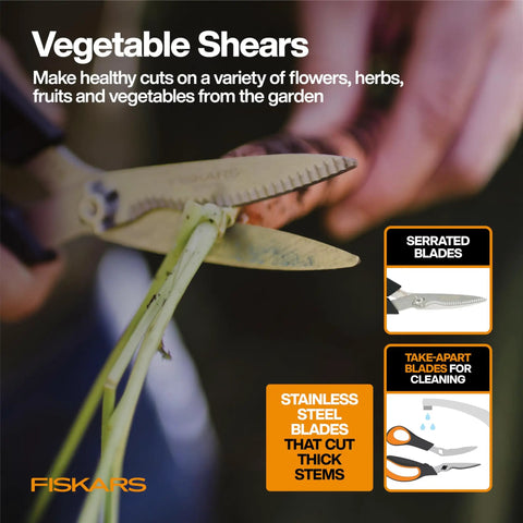 Close-up of serrated stainless steel shears cutting plants, part of All In One Veg Garden Tool Set With Serrated Stainless Steel Shears Four In One Seed Sower Rust Resistant Trowel Cultivator Weeder And L XL Garden Gloves For Easy Planting And Harvesting.