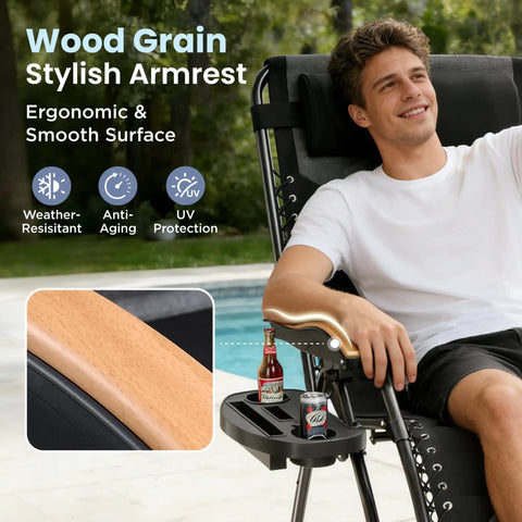 Person relaxing on Big And Comfy Oversized Zero Gravity Chair With Cup Holder 30 Inch Wide Seat Foldable Patio Recliner in Black