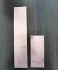Magnetic copper spoon backer showing two 5-inch copper panels on a dark surface.