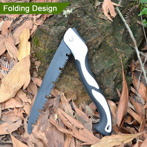Go-To Folding Hand Saw 12 Inch for tree trimming and pruning with high manganese steel teeth on ground by leaves