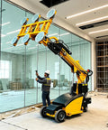 Kickass Mobile Hydraulic Glass Vacuum Lifter With Grippy Suction Cups lifting large glass panels in a modern interior space.