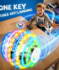 360 Degree RGB Light Rotation Kids Drone With Altitude Hold One Key Takeoff And Landing Side Fly Super Fun 3 Speed Modes And Trim Indoor Outdoor RC Quadcopter Gift For Boys And Girls in action with colorful lights on a table next to a smiling child holding a remote.