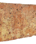 Close-up of a single Old World brick paver from Veneer Stone Rubber Molds For Concrete, 9x4x3 inches, recycled material