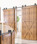 Black Rustic Single Track Bypass Sliding Barn Door Hardware Kit For Four Doors 10 Foot Flat Track With Spoke Wheel Rollers Includes Two Flat And Two Bent Roller Sets Pro Grade Easy Install Smooth Glide And Quiet Operation