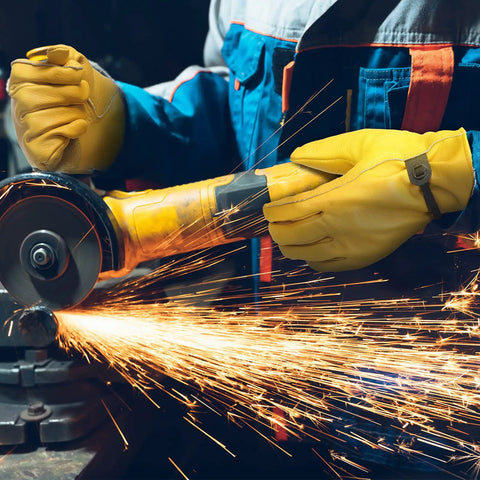 Person wearing Rugged Leather Work Gloves For Men And Women, Cowhide Build That Holds Up To Real Work, operating a grinder