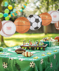 8 Pack 12 Inch Sports Paper Lanterns Set for Party Decor Includes Soccer Ball Basketball Baseball American Football and Japanese Hanging Lanterns Reusable Game Day Birthday Favors for Kids over decorated table