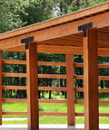 Heavy Duty T Post Brackets And Beam Connectors For Fence Repair Solid Black Carbon Steel Mending Plates attached to wooden frame
