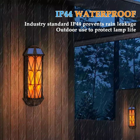 74 LED Flickering Flame Solar Wall Lights Outdoor Sconces Auto On Off Waterproof Lanterns installed on wall in rain