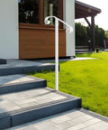 Heavy Duty Wrought Iron Non Drill Handrail Railing For Outdoor Steps Featuring In Ground Single Post Setup Plus All Weather Black Paint Finish That Is Built Like A Tank For Your Exterior Walkway, white handrail near outdoor stairs.