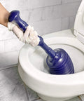 Proven Heavy Duty Bellows Plunger Knocks Out Stubborn Clogs Quick Built With Automatic Air Relief Valve To Prevent Overflow Handles Tight Spots On Toilets Kitchen Sinks And Garbage Disposals Navy Blue in use on a toilet.