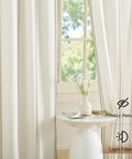 Stripe Linen Curtains 52x84 Inch for Living Room Cozy Vibe Taupe and White Grommet Drapes installed near a window.