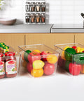 Straight Fire Kitchen Organization To Keep The Mess Tight With This Six Pack Of Large Clear Pantry Bins Boasting Heavy Duty Handles For Fridge Cabinet Freezer Sorting, filled with fruits and sauces.
