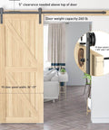Wooden door installed with 6.6Ft Barn Door Hardware Kit With Adjustable Floor Guide For Quiet, Smooth Sliding - Built Tough, Heavy Duty Track System Fits 36 To 40 Inch Wide Panels, Black I Shape Hanger
