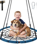 Child with dog on 40 Inch Spider Web Saucer Swing With 750Lb Capacity For Kids Outdoor Backyard Playground Net Swing Easy Assembly Heavy Duty Tree Swing Durable Rope Construction For All Weather Kid Friendly Fun.