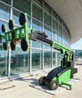 Heavy Duty Industrial Vacuum Lift Cart For Glass And Marble Slabs Built Tough Workshop Handler, green with suction cups at airport.