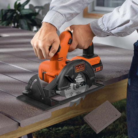 Man using compact circular saw from 20V Max Cordless Power Tool Kit With 4 Tools, 2 Batteries And Charger, Drill And Driver