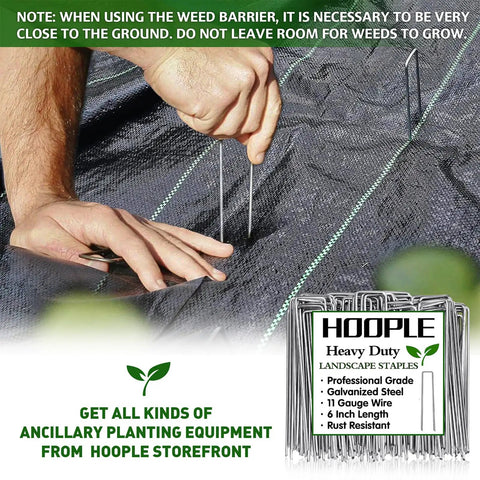 Person installing Heavy Duty Weed Barrier Fabric 3 Ft By 50 Ft Woven Landscape Ground Cover Mat using landscape staples