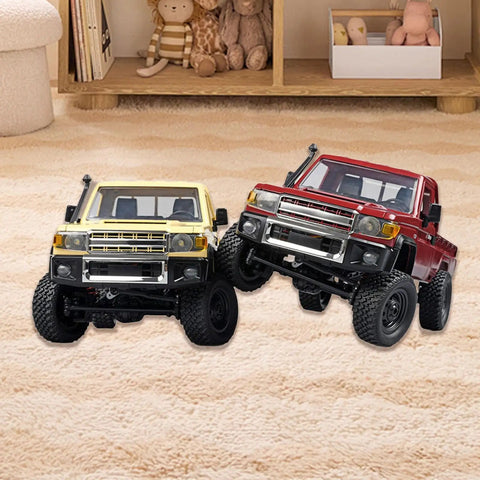 Two 1/12 scale RC crawler vehicles with upgraded metal chassis for heavy duty frame, shown in yellow and red, indoors.