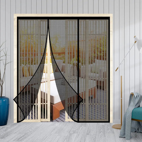 Heavy Duty Magnetic Screen Door With Self Sealing Magnets Hands Free Insect Shield For Patio And Bedroom Sliding Doors Up To 60 By 80 Inches Durable Fiberglass Mesh Black, screen hanging open in a living room scene.