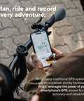 Cyclist using Velo 2 Bike GPS Computer With Wireless Global Navigation For Cycling Weatherproof Build on handlebars