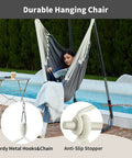 Woman relaxing in a Heavy Duty Hanging Hammock Chair Swing With Footrest For Outdoor Patio Porch Lounge Up To 500 Lbs, Dark Grey.