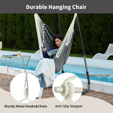 Woman relaxing in a Heavy Duty Hanging Hammock Chair Swing With Footrest For Outdoor Patio Porch Lounge Up To 500 Lbs, Dark Grey.