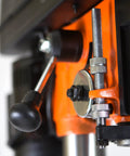 Detail of The Real Deal 12 Inch Benchtop Drill Press With Variable Speed 580 To 3200 RPM, featuring adjustable levers and components.