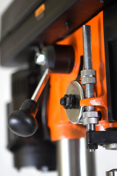 Detail of The Real Deal 12 Inch Benchtop Drill Press With Variable Speed 580 To 3200 RPM, featuring adjustable levers and components.