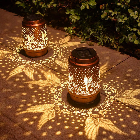 Outdoor Solar Lantern With Hummingbird Pattern, Waterproof Metal Garden Light for yard patio porch or backyard, creating cozy lighting.