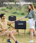 Two people outdoors holding a BLAVOR 120W Portable Solar Panel Charger With PD45W QC3.0 Fast Charge USB C And USB A Outputs