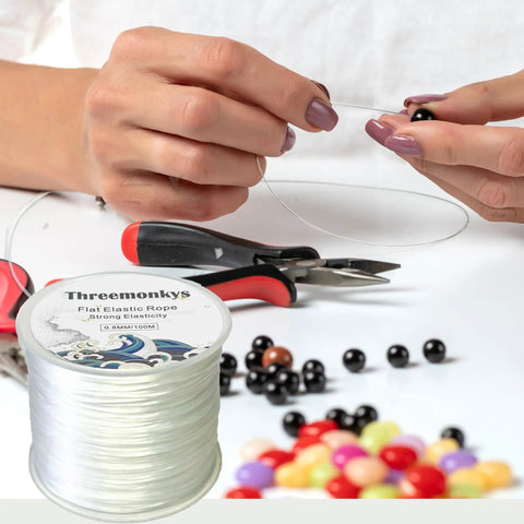 Person using Flat 0.8 mm Elastic Bead Rope for Jewelry Making, clear polyester spandex string, durable for bracelets, 100 m roll