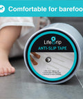 Clear Non Slip Tape 4 Inch By 30 Feet, Grippy Anti Slip Adhesive For Tubs, Boats, Stairs, Safe For Bare Feet, Soft Texture Comfort, Eco Friendly Home Safety Solution product packaging with barefoot child in background.