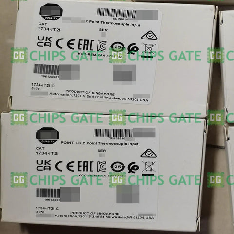 Factory Sealed 1734-IT2I Input Module for Industrial PLC Systems boxes with labels and packaging details visible