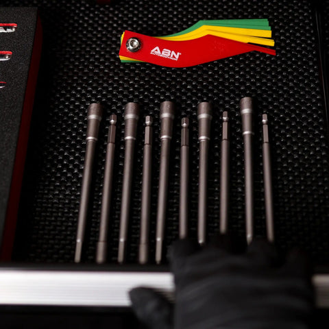 Industrial Strength Magnetic Nut Driver Bit Set 5/16 Inch Hex Bits 10 Piece organized in tool drawer with colorful keys