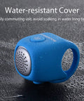 Electric Bike Bell With 90dB Alert And 3 Sound Modes Waterproof Black Finish Easy To Install For Daily Commutes Durable Bicycle Horn For E Bikes Loud Yet Clear Warning For Safer Rides blue silicone bell with water-resistant cover on wet surface