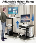 Heavy Lifter Mobile Workstation Cart With No Sweat Rolling Casters And Fully Adjustable Gas Spring Monitor Stand Plus Secure CPU Tray For Seamless Standing Desk Transitions In Matte Black in use, height adjustable from 31.5" to 47.2".